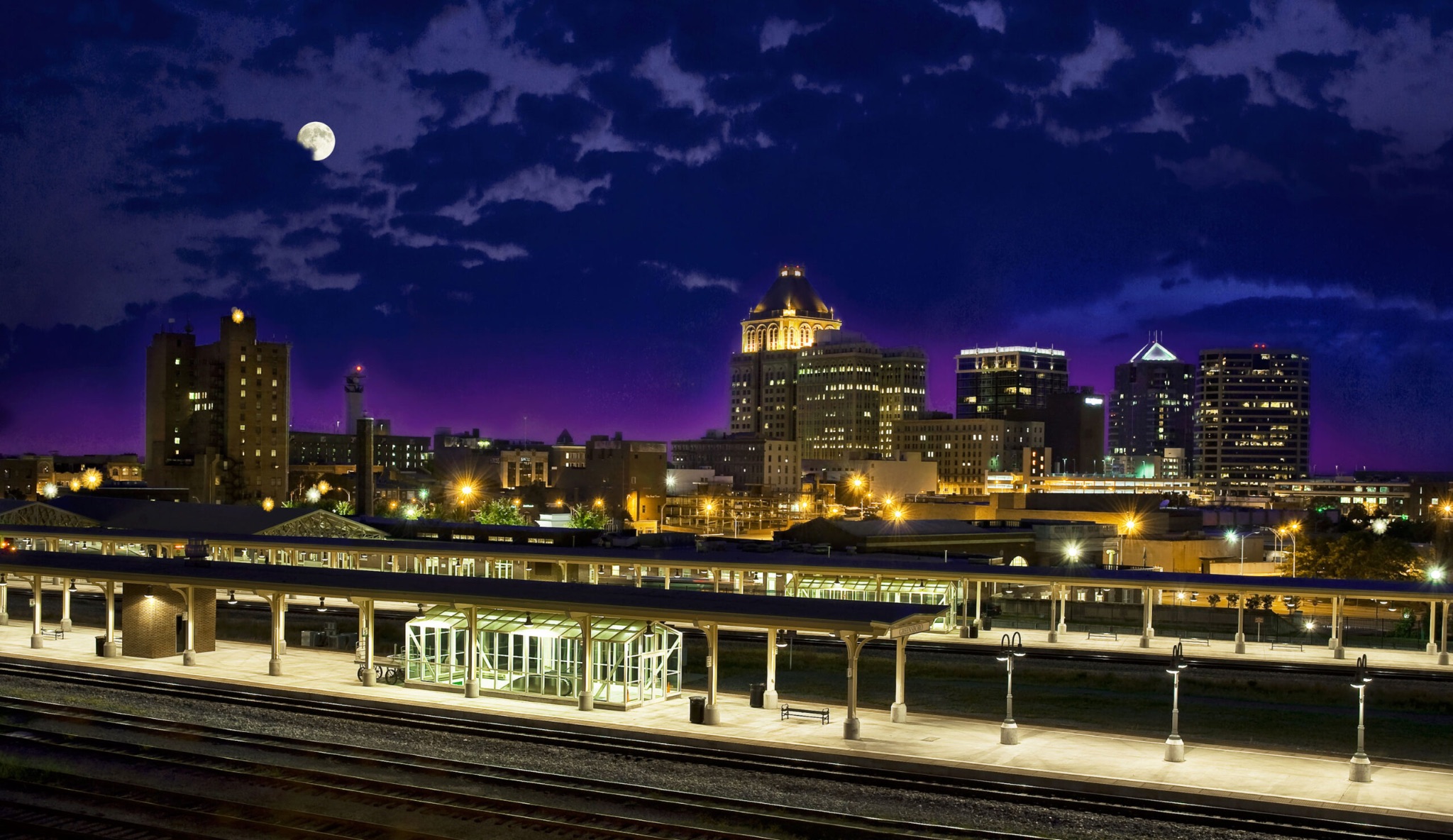 Greensboro, NC train station and skyline at night